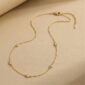 CrystalStationNecklace1flatlaybeigebg