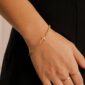 GoldBeadedCrossStretchBracelet-Model