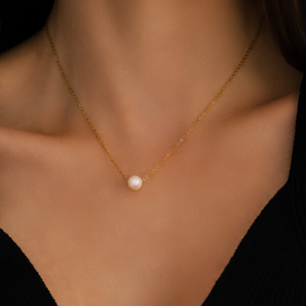 M-L-FLOATING-PEARL-NECKLACE-1-2-2_Large_9a9648c3-3b66-4e97-95c3-a615561ddc4a
