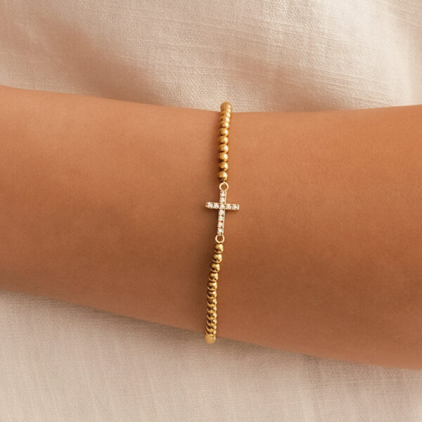 stretch_cross_charm_bracelet_model_2